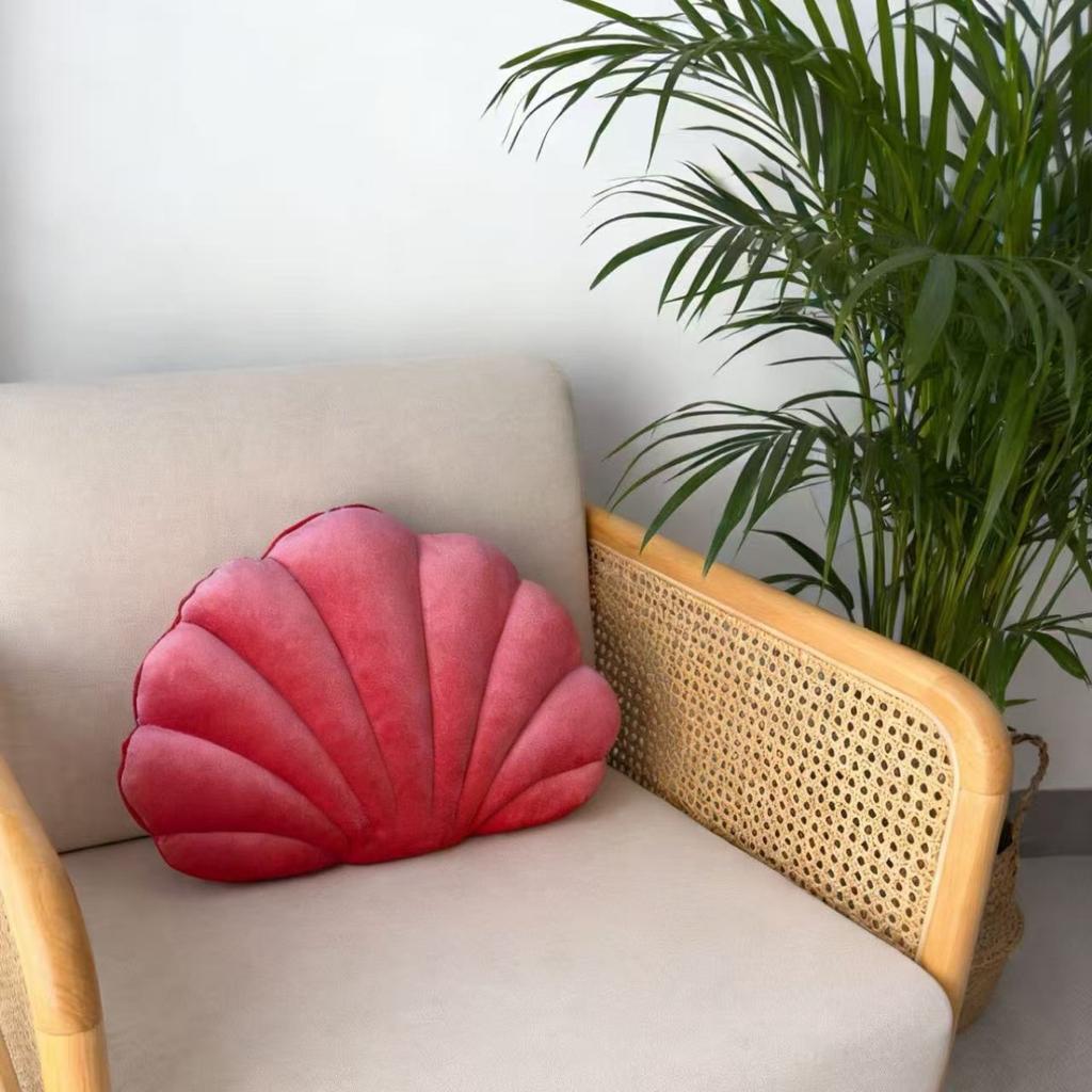 A seashell-shaped pillow, suitable for living room sofas, bedrooms, offices, and home decor.