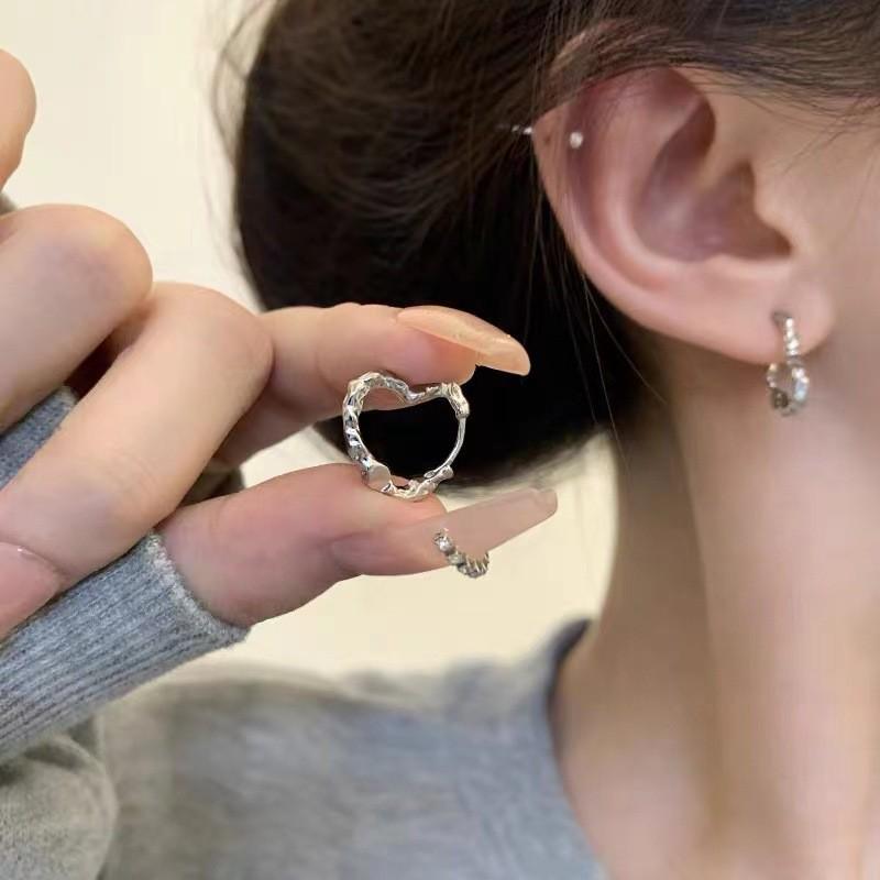 Luxurious Gold Heart Stud Earrings: Chic, Fashionable, and Versatile Accessories.