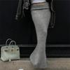 2025 Spring/Summer European Street Style Knit Bodycon Skirt: Solid Color, Turn-Up, Low Waist, Slimming Midi Skirt