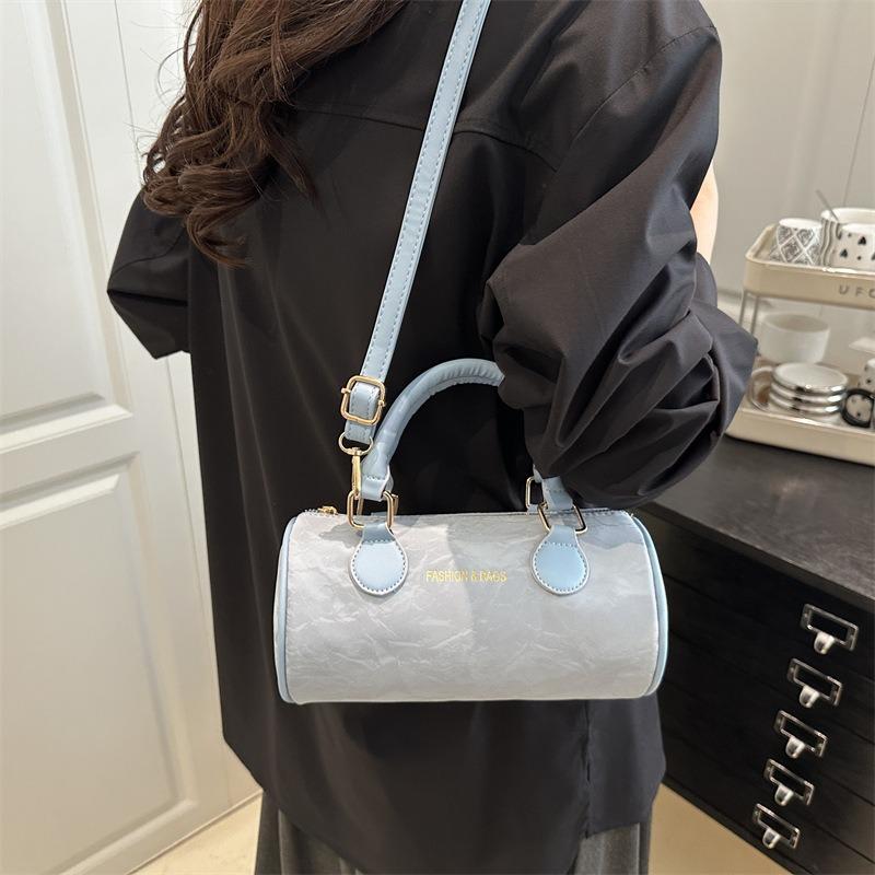 Niche design cylinder handbag new temperament versatile high sense messenger bag fresh and sweet shoulder bag