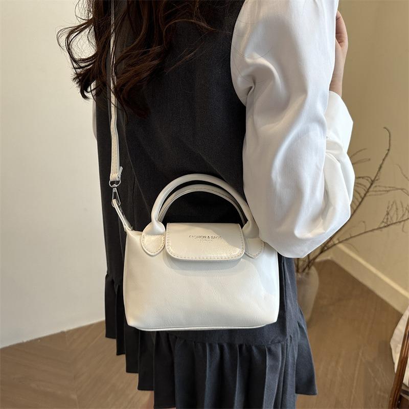 Spring and summer retro portable small square bag popular niche design women's bag versatile single shoulder diagonal span dumpling bag