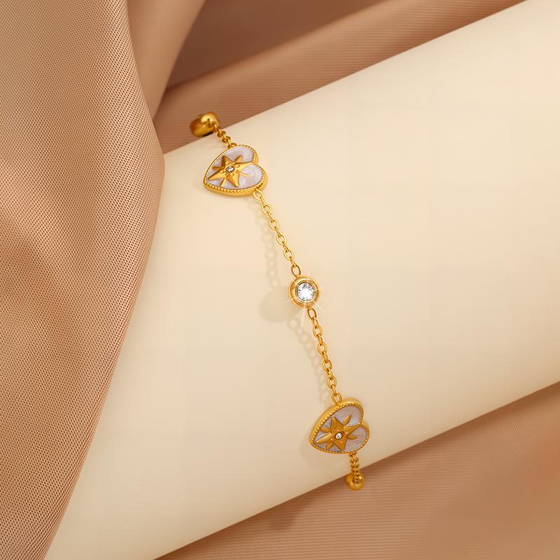 Elegant Women's Titanium Steel Bracelet with Diamond-Embedded Four-Leaf Clover and Eight-Pointed Star Design