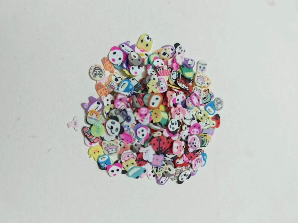 Cartoon Polymer Clay Slices: Butterfly, Flower, Moon Shapes for DIY Nail Art Accessories.