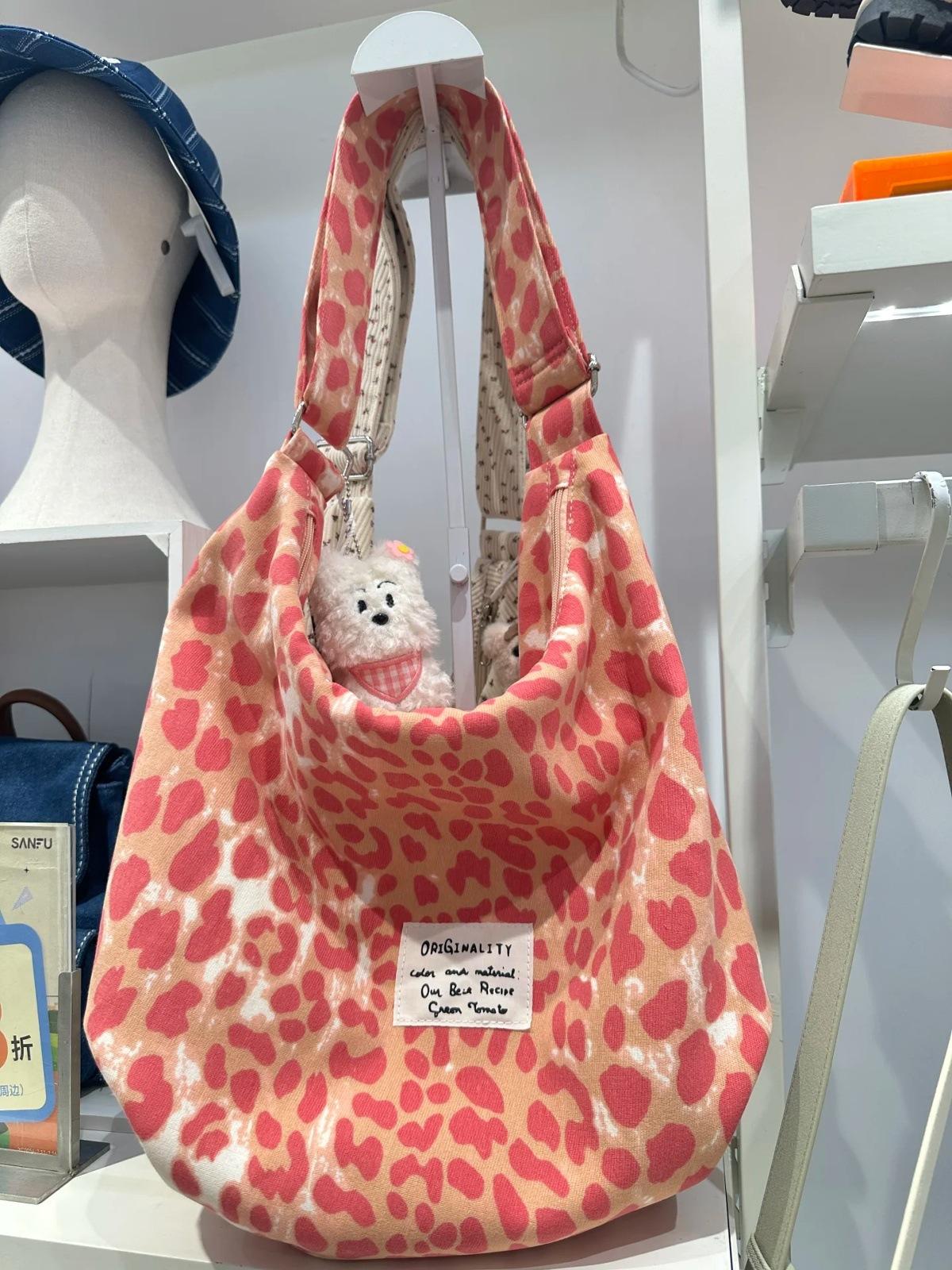 

Корейская холщовая сумка с розовым леопардовым принтом, женская 2025 новая, большая вместительная сумка-тоут для поездок на работу, нишевая наплечная сумка-мессенджер