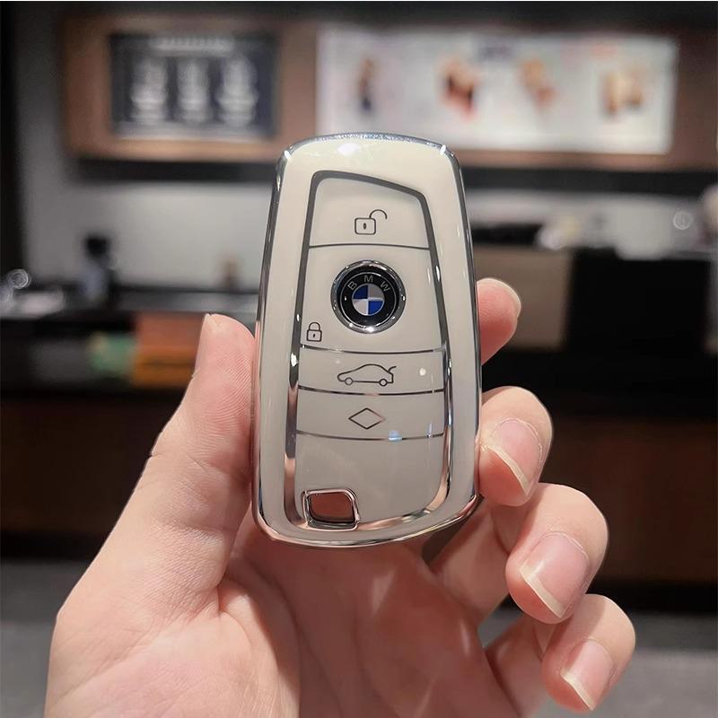 

BMW Car Key Cover for 1, 3, 5, 7 Series and X1-X6, compatible with 320Li, 530Li models. Stylish shell bag for your car keys.