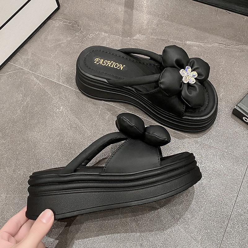 

Женские летние шлепанцы на платформе 2025 новинка универсальные для улицы увеличивающие рост маффины шлепанцы на одно слово сандалии с цветами высокого класса женские 40 чёрный