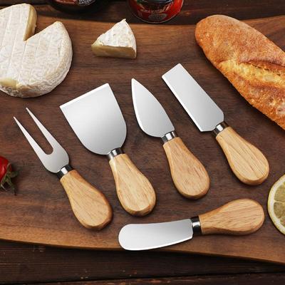Stainless Steel Cheese Knife Set with Rubber Wood Handle: Includes Knife, Fork, Spatula, and Butter Cream Knife.