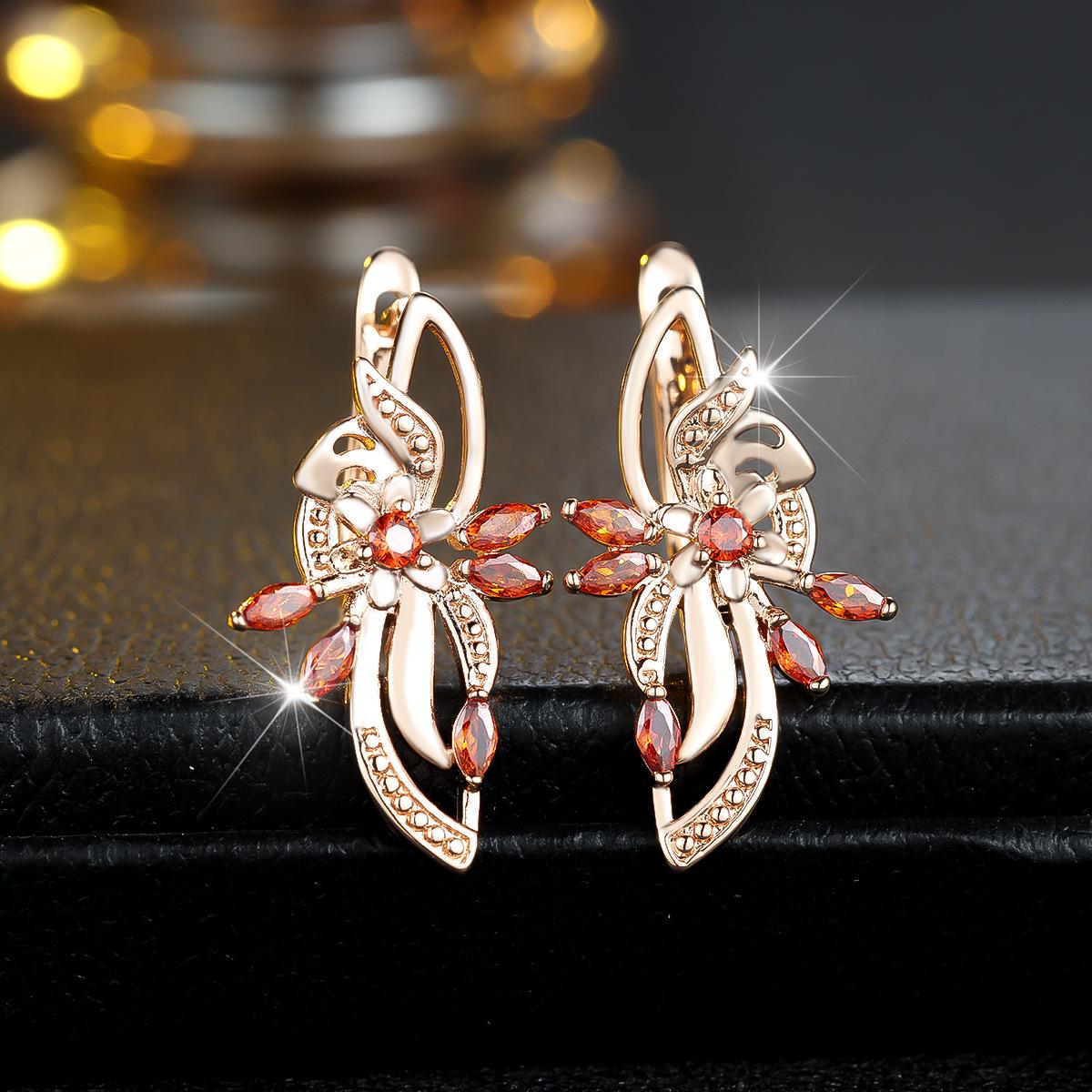 

Popular wind hollow flower-shaped ear buckle female bling zircon + tendrils atmosphere niche flower cluster earrings