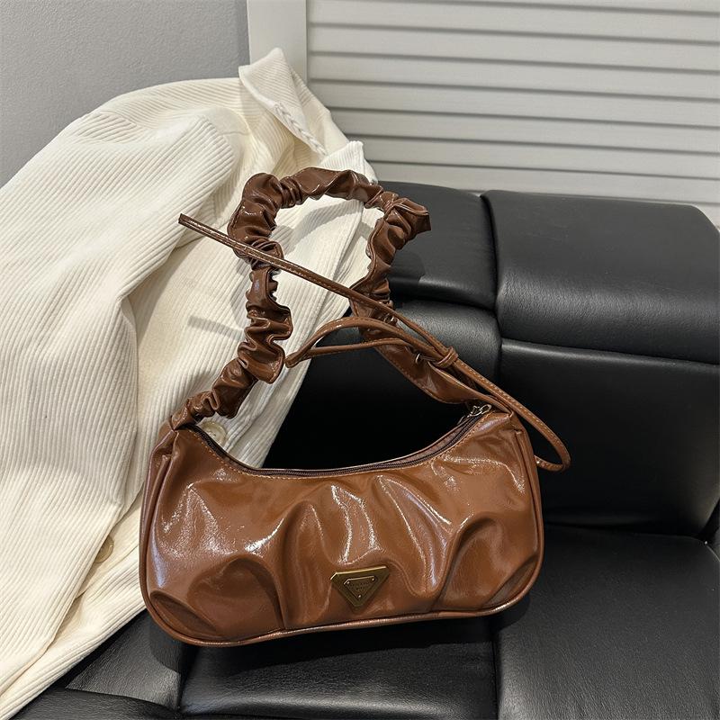 

Folded bow bag women s 2025 new messenger bag niche design sense foreign high sense underarm bag tide