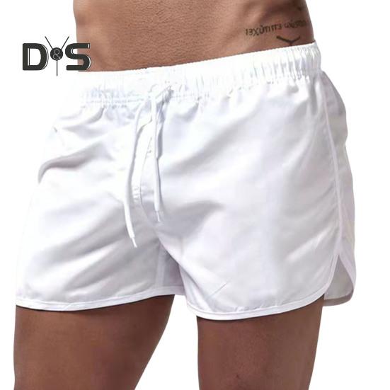Sommer Low Rise Elastischer Bund Kordelzug Strand Surfen Shorts Atmungsaktive Seite Unregelmäßige Trim Männer Bademode Shorts
