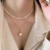 Black And White Double-Sided Shell Love Pendant Necklace Light Luxury Temperament Niche Design Titanium Steel Sweater Chain