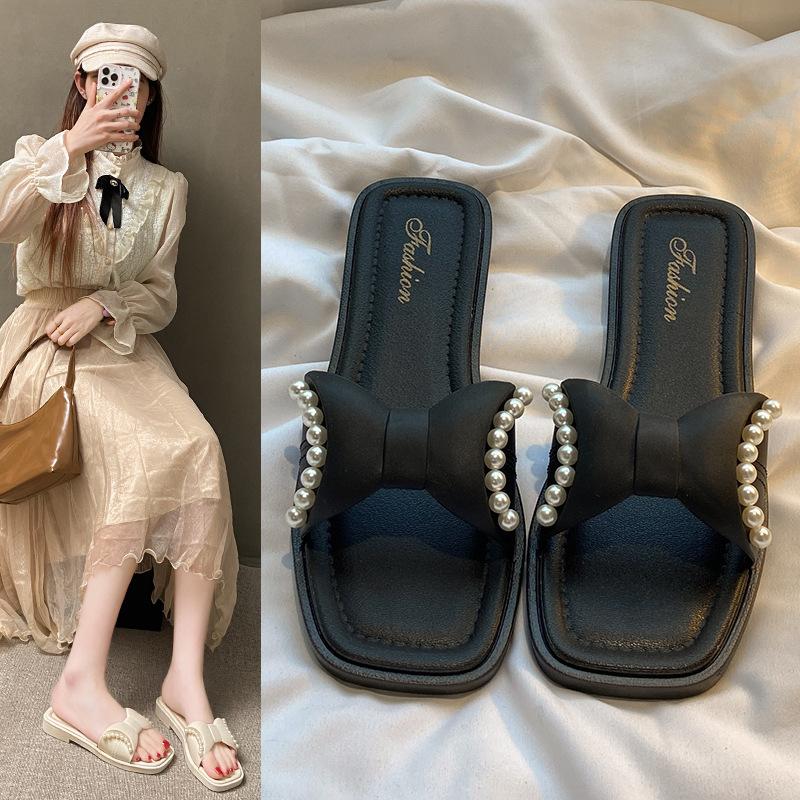 

Pearl Xiaoxiangfeng outer wear flat-bottomed women s slippers summer style versatile beach soft-bottomed non-slip thin women s slippers 40-41 [one size smaller] чорний