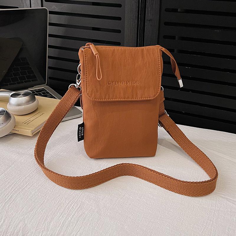 Versatile Nylon Mini Crossbody Bag - Lightweight, Waterproof, Wear-Resistant, Fashionable Summer Coin Pouch and Small Backpack.