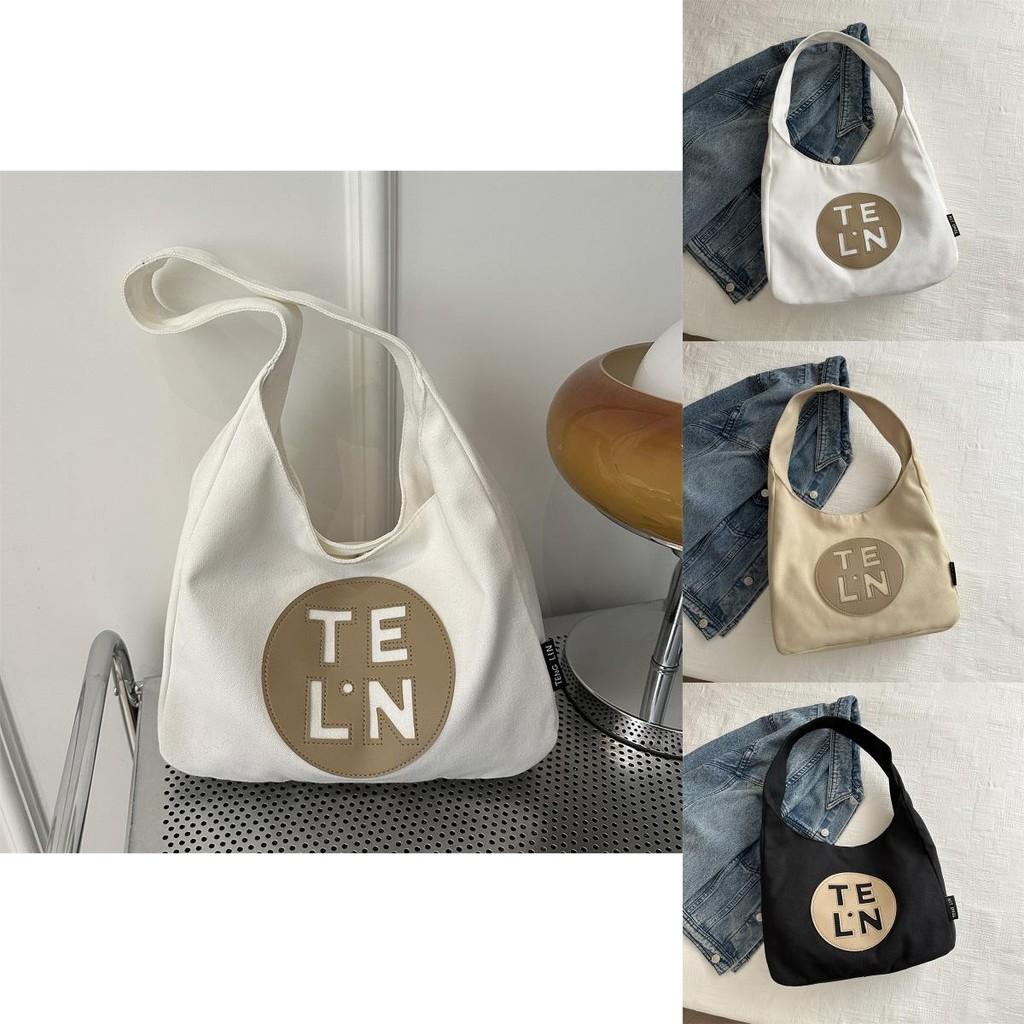 Stylish And Spacious Black Canvas Tote Bag For Women Ideal For Spring Commute And School