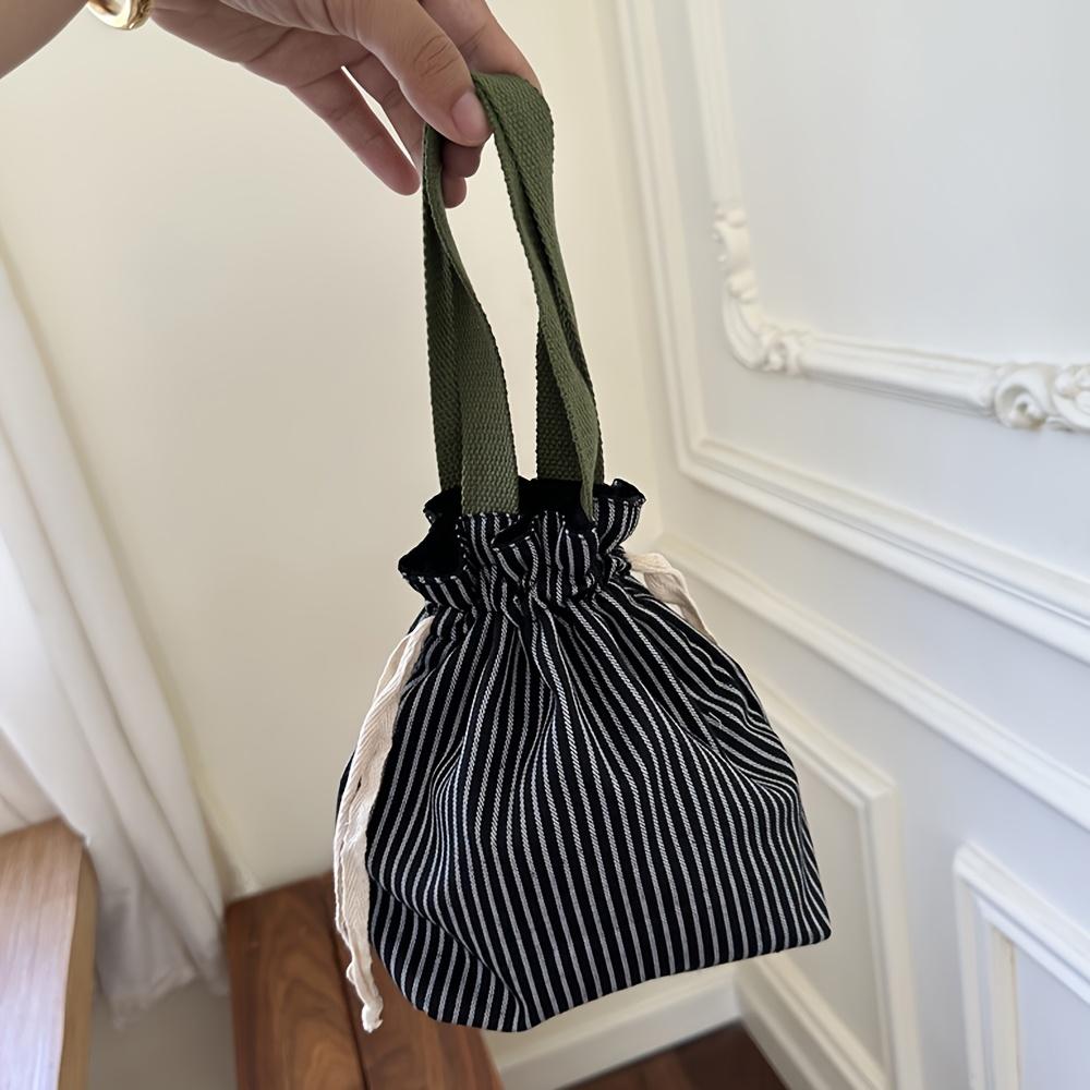 

1pc Preppy Style Striped Drawstring Tote Bag, Portable Polyester Handbag with Unlined Interior, Fashionable Travel Pouch for Cosmetics and Accessories чорний