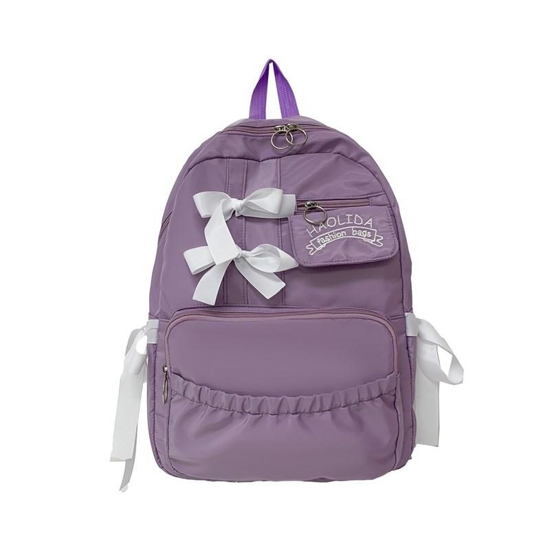 

Japanese contrasting backpack 2025 new bow pleated student schoolbag women s college style cute versatile backpack фиолетовый