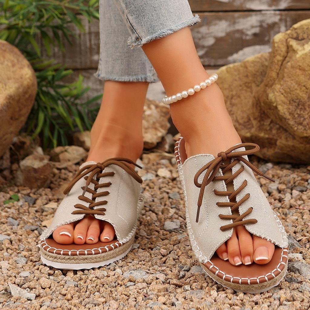 In the Summer of 2025, the New Round Head Solid Color Large Size Front Strap European and American Style Women's One-character Thick-soled Slippers.