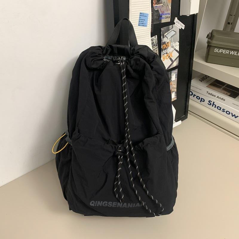 Solid color simple backpack, new drawstring outdoor, light sports and capacity, travel anti-splashing water-resistant wear-resistant and versatile