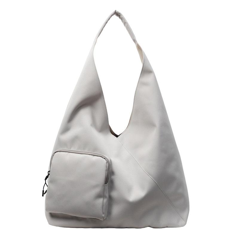 Japanese simple handbag bag women's 2025 new large-capacity niche design casual crossbody bag commuter tote bag