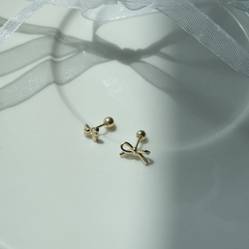 youngglow 14k knotted ribbon piercing