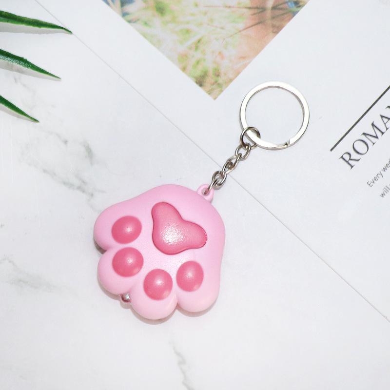 Glowing Cat Paw Bell Keychain: Cute Charm for Bags and Couples Flat Ring