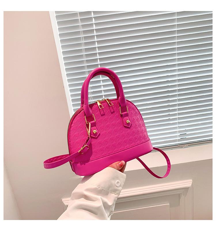 

Жіноча проста сумочка 2024, осінь, новий іноземний стиль, суцільна кольорова сумка через плече, корейська версія, модна темпераментна сумка-раковина рожевий червоний колір