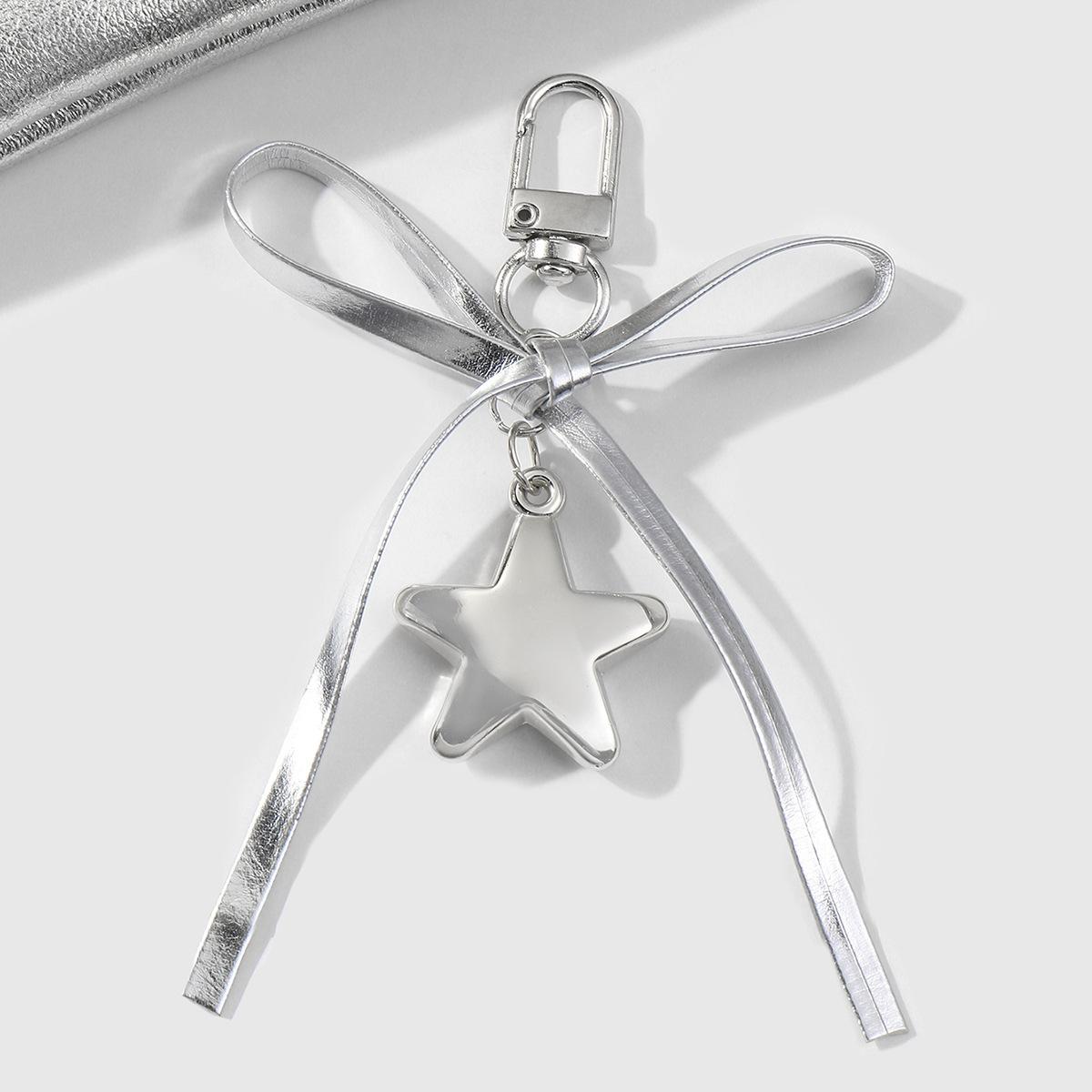 

Explosive light luxury simple exquisite silver leather bow three-dimensional love star bag pendant keychain