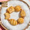 Der gleiche Stil wie der Little Red Shop: Holzkohle-gebranntes Elfenbein-Fruchtschnitzerei-Armband, süßes brotförmiges Elfenbein-Frucht-Kulturspielzeug-Armband für