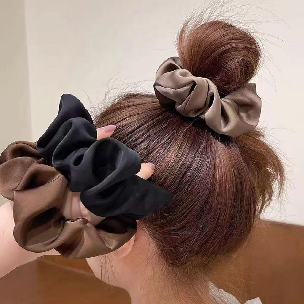 Satin-Feel Scrunchie: Versatile Luxury Hair Tie for Women, Elevates Style & Compliments Skin Tone.