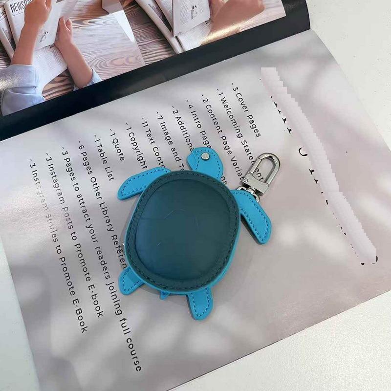 2025 New Leather Pendant Head Layer Leather Mini Earphone Bag Turtle Pendant Wallet Cross Border