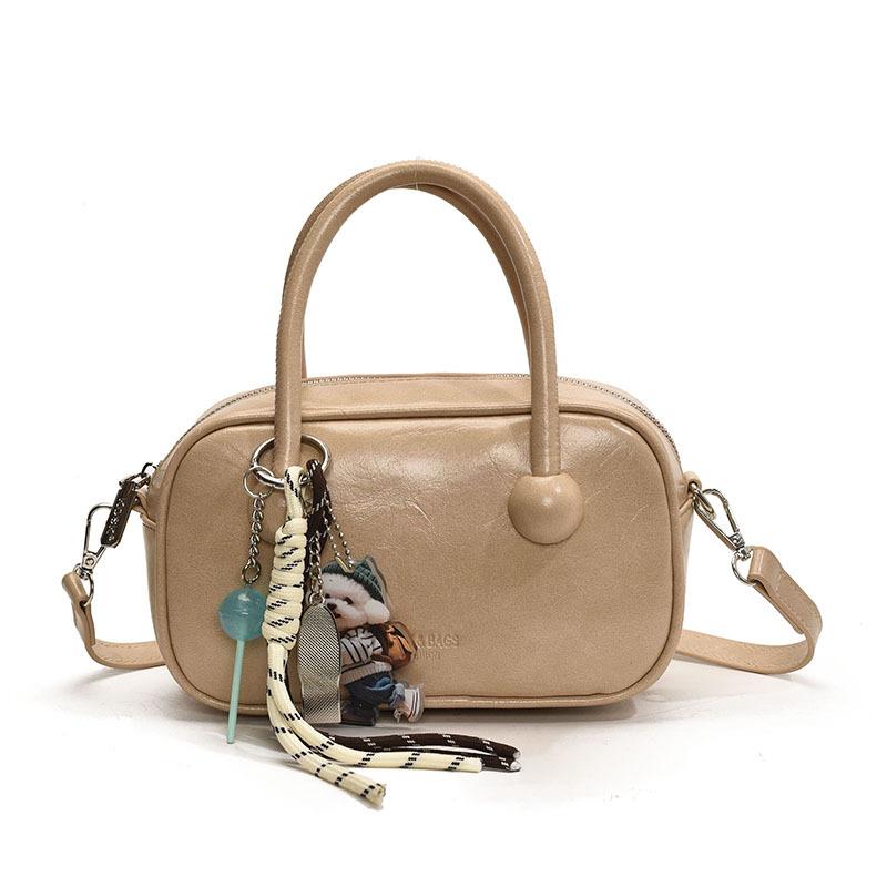 Hand-held bowling bag 2025 new fashion simple shoulder bag high-end niche women's bag