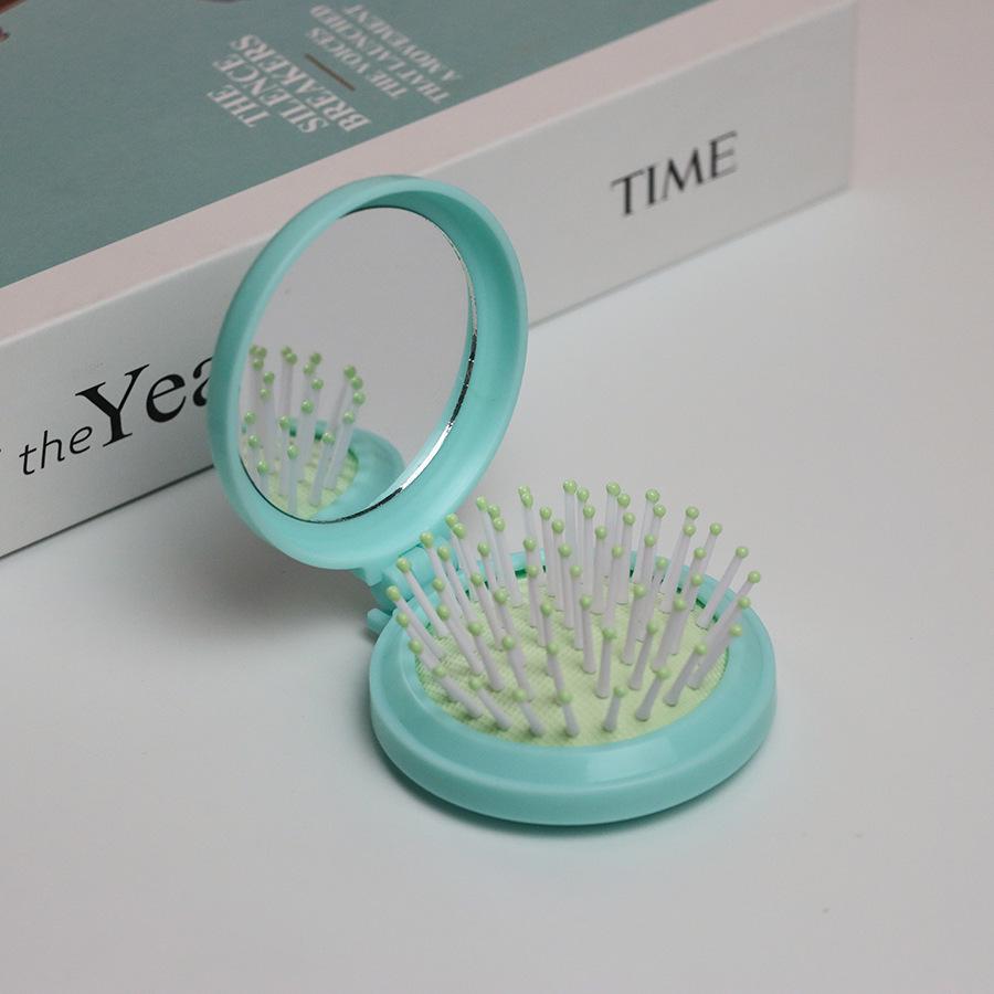 Kompakter Klappkamm & Schminkspiegel mit Airbag-Polster für Kopfmassage