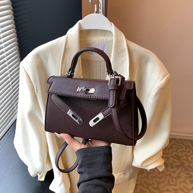 2025 neue Internet-Promi-Tasche Nische Schulter Umhängetasche Premium Koreanische Version tragbare kleine quadratische Tasche klassische Kelly-Tasche
