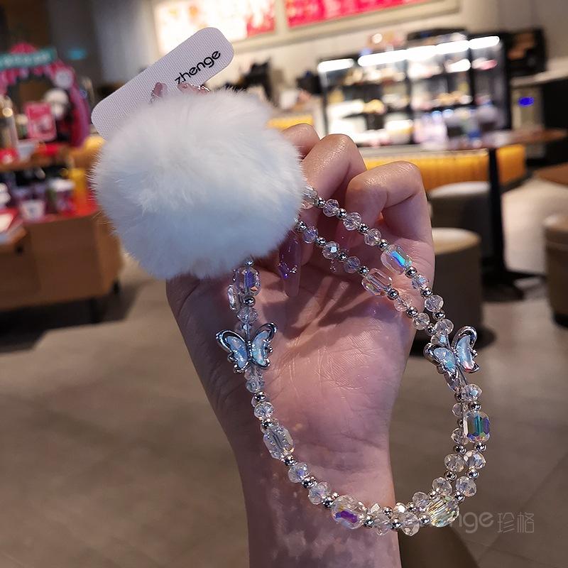 

Boutique crystal bracelet, mobile phone lanyard ins handmade beaded pendant, women s high-end wrist butterfly pendant short white two butterfly pom-pom crystal double chain