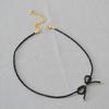 Japanese and Korean niche simple and delicate black pointed crystal bow handmade beaded elegant temperament short necklace choker
