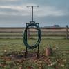 Garden Hose Holder with Spikes Decorative Scrollwork Freestanding Pointed Stakes Yard