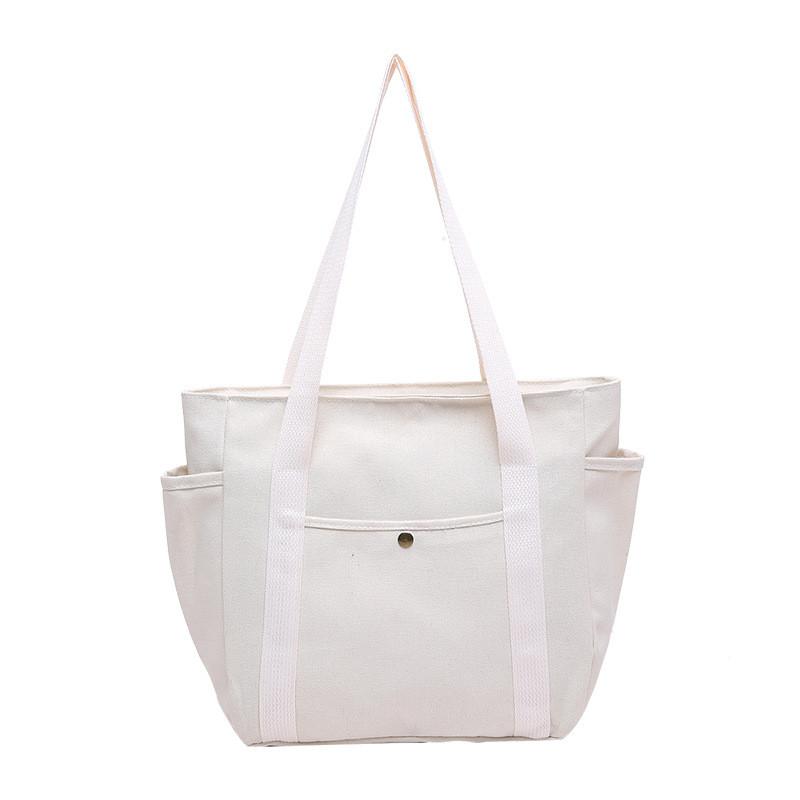 Spacious Canvas Tote Bag For Work And Leisure Stylish Commuter Must-have Accessory