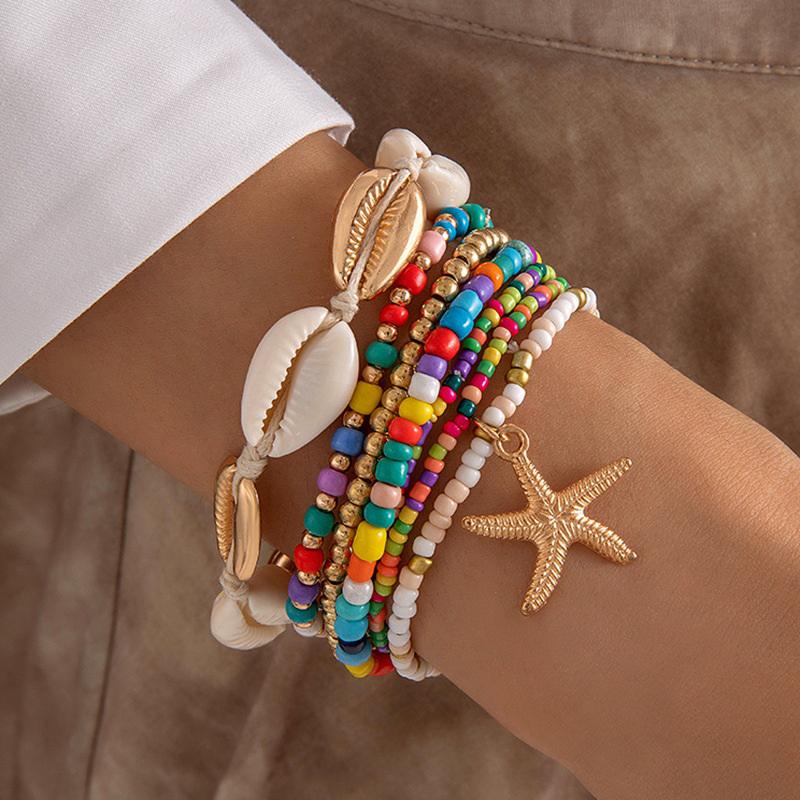 Set da 7 Pezzi Stile Bohémien Resort Braccialetto Intrecciato con Perline di Conchiglie Set di Braccialetti con Perle di Riso Stella Marina Stile Spiaggia Per Donna