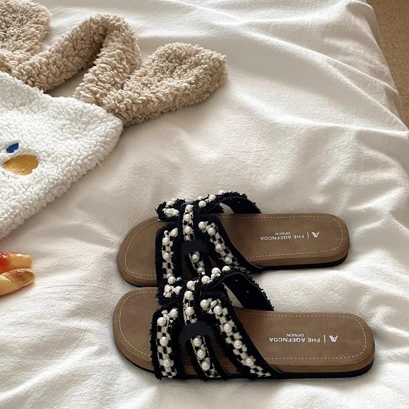 

Super soft leather pearl woven retro trendy sandals women s summer new outer wear French gentle wind niche flat-bottomed slippers 35 чёрный