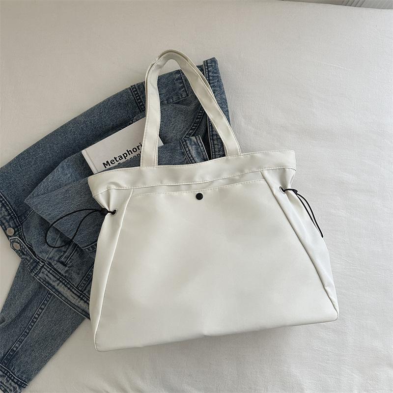 Canvas bag women's new model, popular this year, large-capacity tote bag, summer versatile shoulder class commuter bag