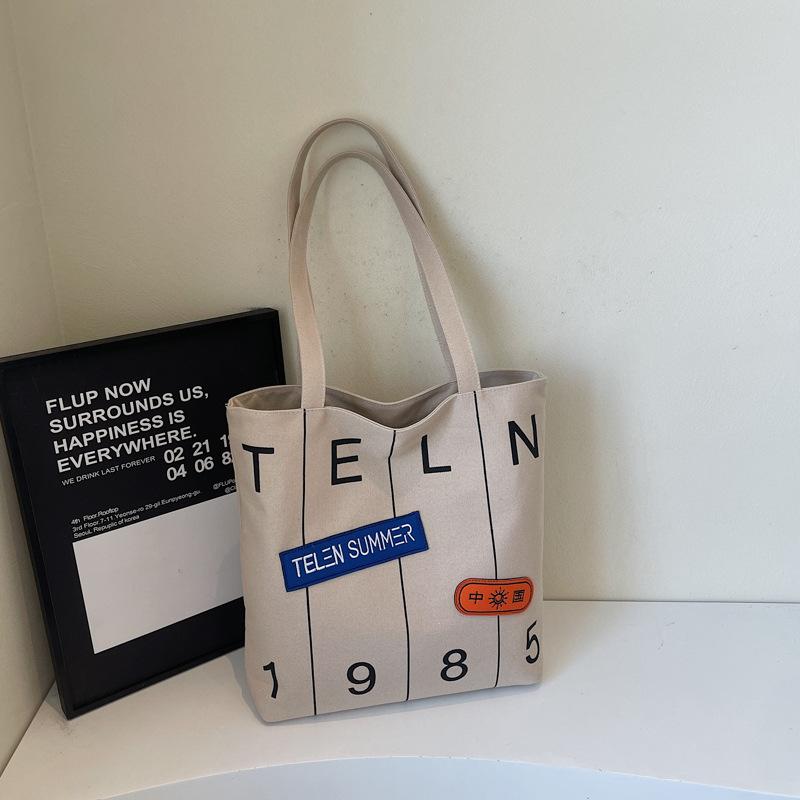 

Новая корейская версия ретро зарубежного нишевого дизайна 2025 повседневные мужские и женские сумки через плечо большой вместимости сумки-тоут