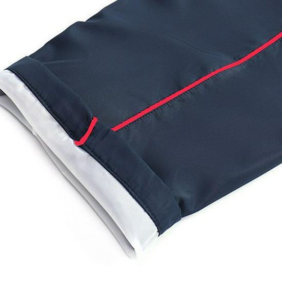 Unisex Dark Blue School Pants with Red Stripe - Loose, Straight-Leg Design for Primary To High School Students.