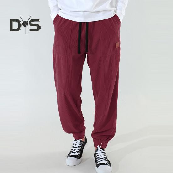 Pánské jarní podzimní kalhoty s bočními kapsami stahovací šňůrka v pase rovná noha tlustá manšestrová jednobarevná volné sportovní kalhoty