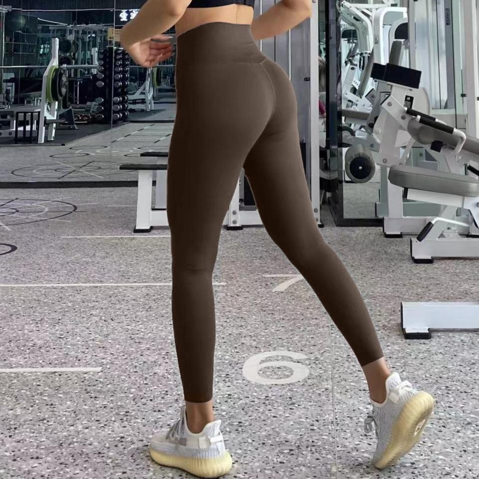Seamless Zero-Feel Yoga Pants: High-Waisted, Bare-Skin Comfort, Back Pocket, Peach Butt Lift, Tight-Fit for Running and Fitness.