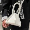Trendy new product design twist portable geometric folding handbag bag high-end sense niche fashionable messenger women's bag