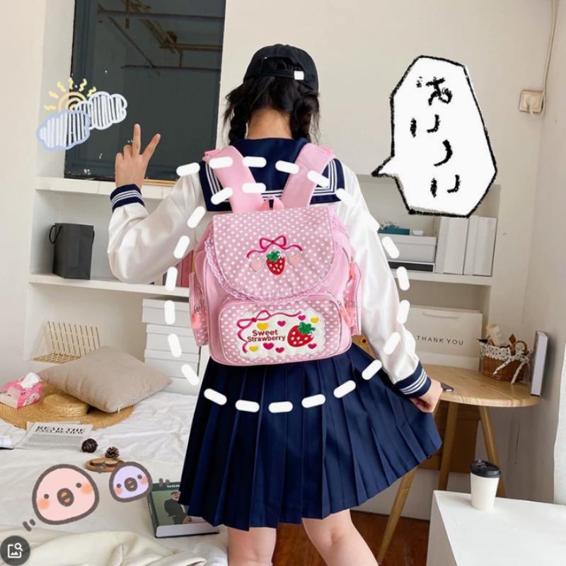 Rosa Mädchenstickerei Erdbeere Kinder-Schulranzen Schüler-Geburtstagsgeschenk 2026 Neuer Japanischer Cartoon Rosa Rucksack Schultaschen