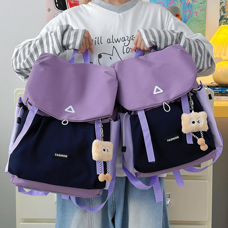 

Трендовый рюкзак кросс-бордер с цветными блоками – большие и маленькие размеры для повседневных путешествий Small 26*10*38 фиолетовый