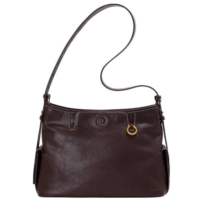 Vegetable-Tanned Cowhide Tote: New Style 2026 Women's Commuter Shoulder Bag with High-End Feel and Unique Design.