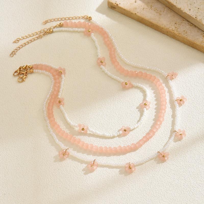 Flower beaded necklace, new multi-layer stacking, niche personalized accessories, women's rice bead necklace