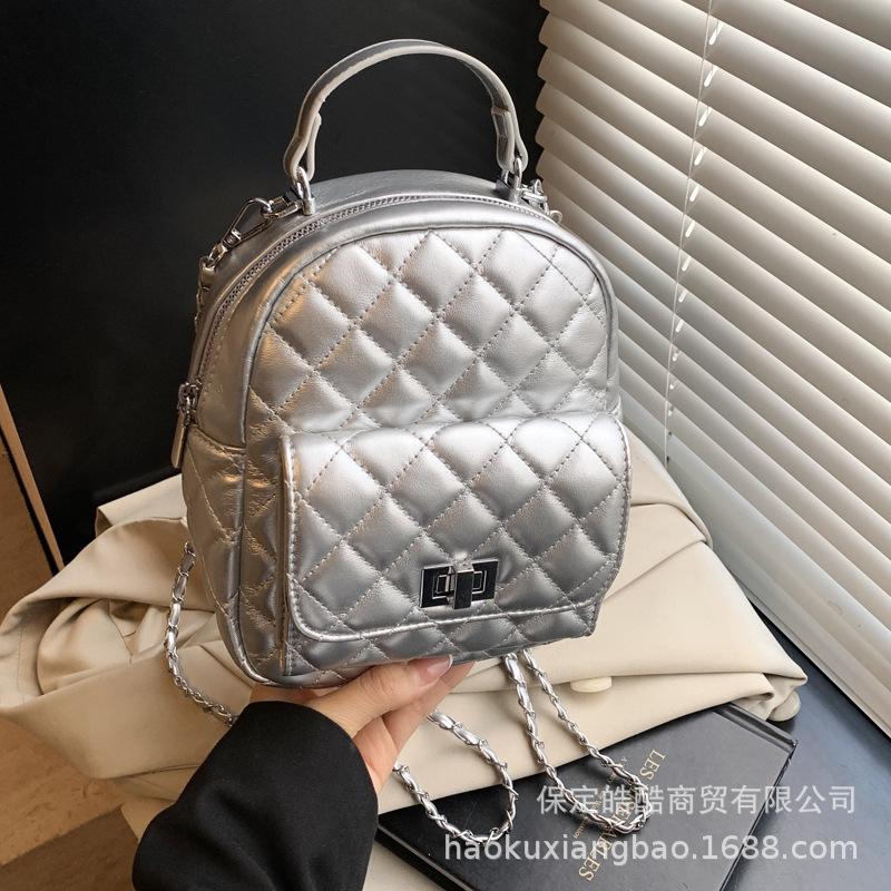 Rhombus chain backpack women's fashion niche design high value Korean version schoolbag high sense mini travel backpack